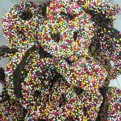Mini chocolate covered pretzels with rainbow non pareils